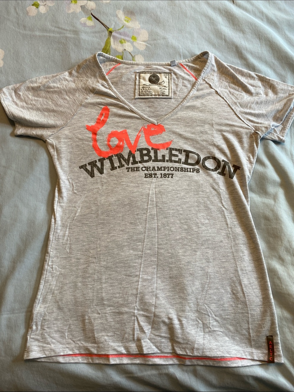 Wimbledon Gray V-Neck Tee with Coral 'Love' Graphic